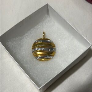 Elegant Gold and Silver Pendant